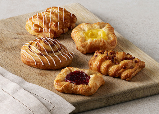 80531 Mini Danish Selection of Schulstad Pastries including Cinnamon Swirl, Vanilla Crown, Raspberry Crown, Maple Pecan, and Apple Coronet