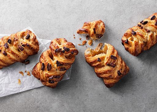 Schulstad Large Maple Pecan Plait Danish Pastries with sweet maple filling woven between layers of dough and finished with pecans