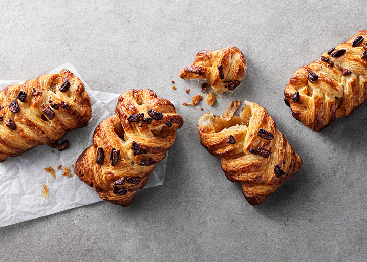 Schulstad Large Maple Pecan Plait Danish Pastries with sweet maple filling woven between layers of dough and finished with pecans